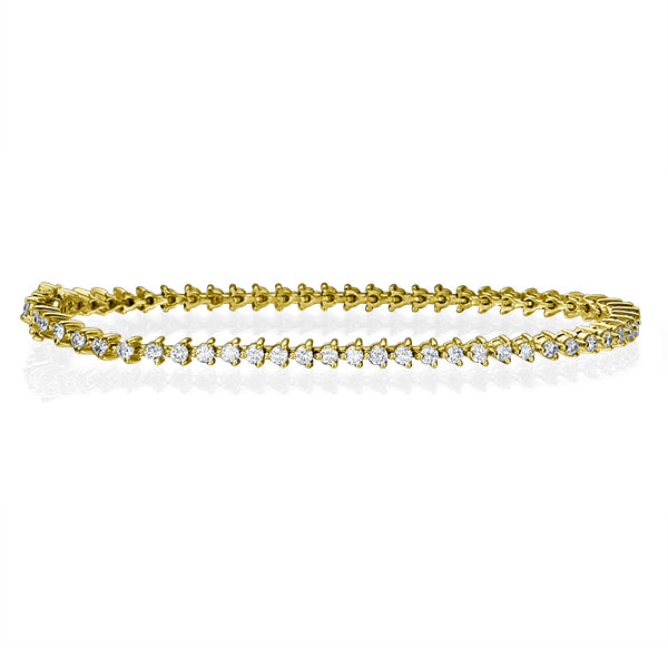 צמיד יהלומים דגם טניס עם שלוש שיניים המשובץ בזהב צהוב יהלומים במשקל 8 קראט