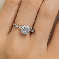 טבעת יהלום עגול בזהב לבן 14K עם עיטורי קוצים  יוקרה בעיצוב חד-פעמי